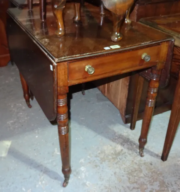 A Victorian mahogany Pembroke table, on ring turned tapering supports, 83cm wide x 72cm high.  K3