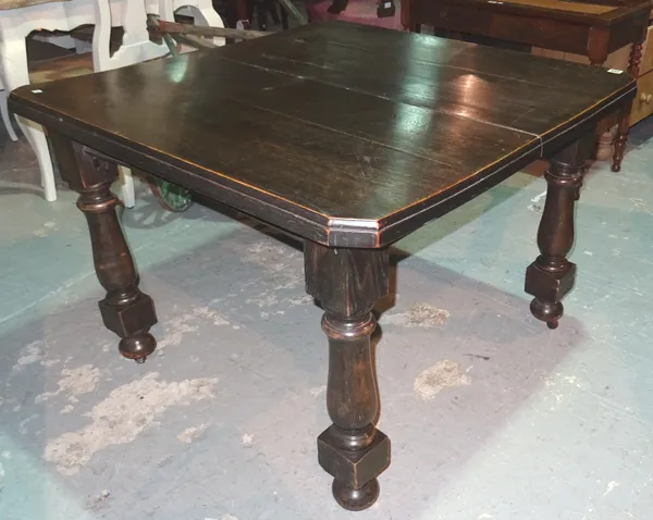 A 19th century oak extending dining table, on turned supports, to include one extra leaf, 102cm wide x 150cm long extended.  H9