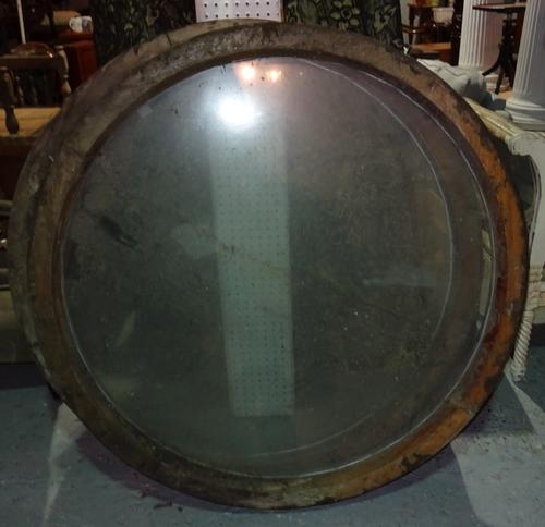 A pair of early 20th century circular window frames, 121cm wide x 121cm high, (2).  J6