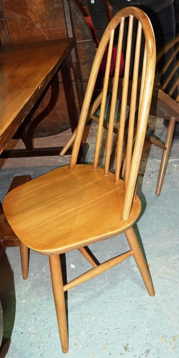 A set of four Ercol style stick back dining chairs, (4). C7