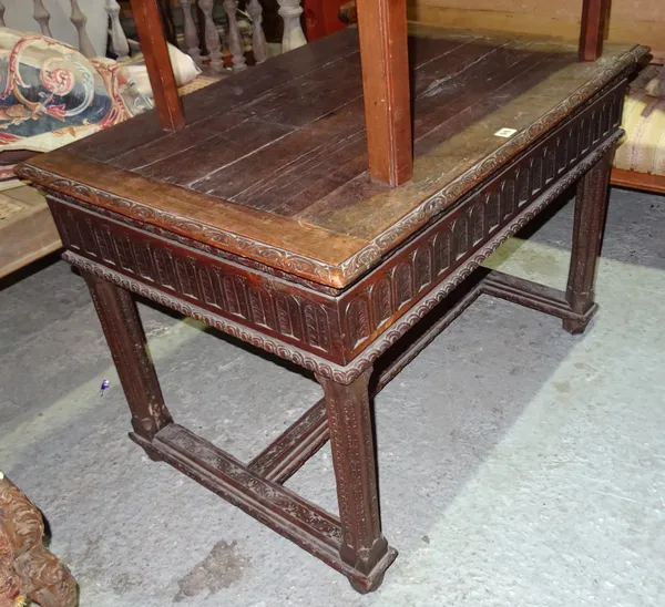 A James I style oak bible box on stand, with fluted carved supports united by carved stretcher, 98cm wide x 68cm high.  J4