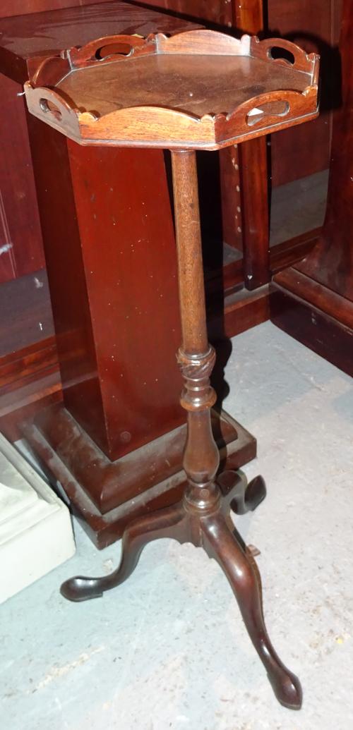 A Regency mahogany octagonal tripod table, with galleried top on three downswept support, 31cm wide x 90cm high.  G9