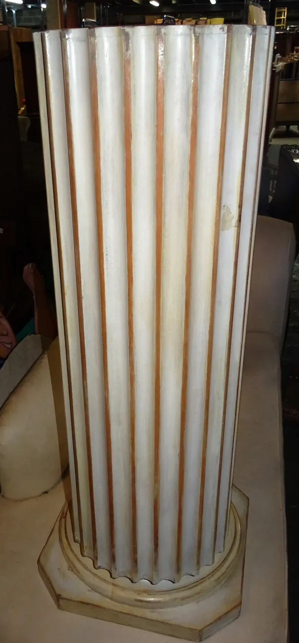 A 20th century white painted parcel gilt fluted column, on canted square base, 100cm high.  A4