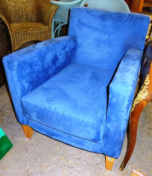 A 20th century blue suede upholstered easy armchair, on tapering square supports. EXTRA