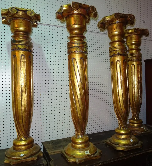 A set of four Regency style giltwood jardiniere stands with fluted central twisted column, 26cm wide x 103cm high, (4).   E10