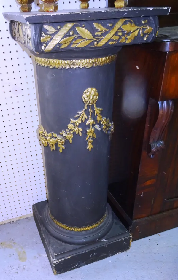 A new classical style black painted jardiniere stand with gilt floral decoration on plinth base, 41cm wide x 103cm high.  A9