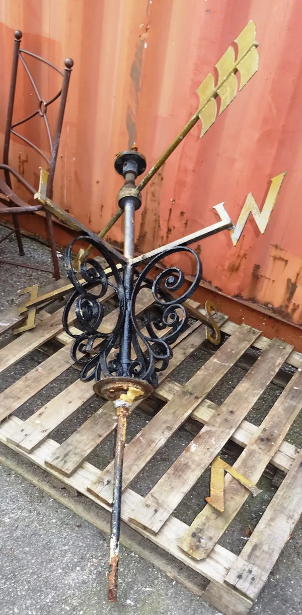 An early 20th century cast iron weather vane, lacking decorative ornament to top.  OUT