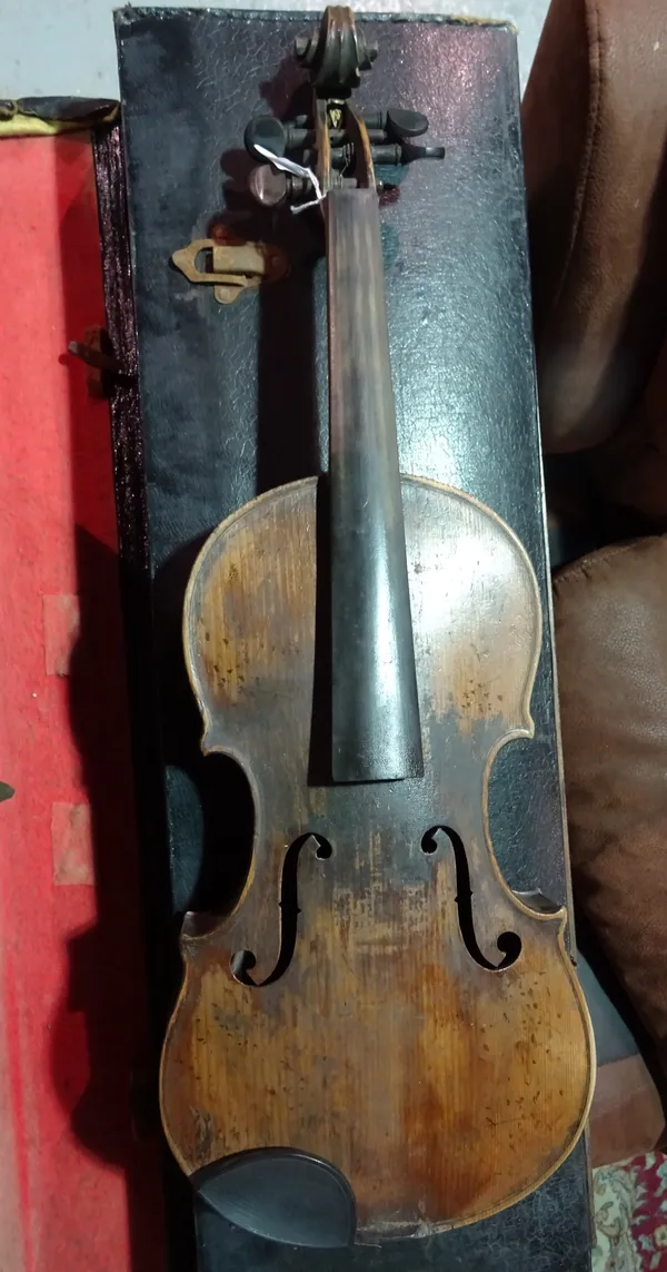 A violin, late 19th/early 20th century, with interior paper label 'Copy de Antonius Stradivarius Cremonentis Faciebat Anno 1721' two piece back minus