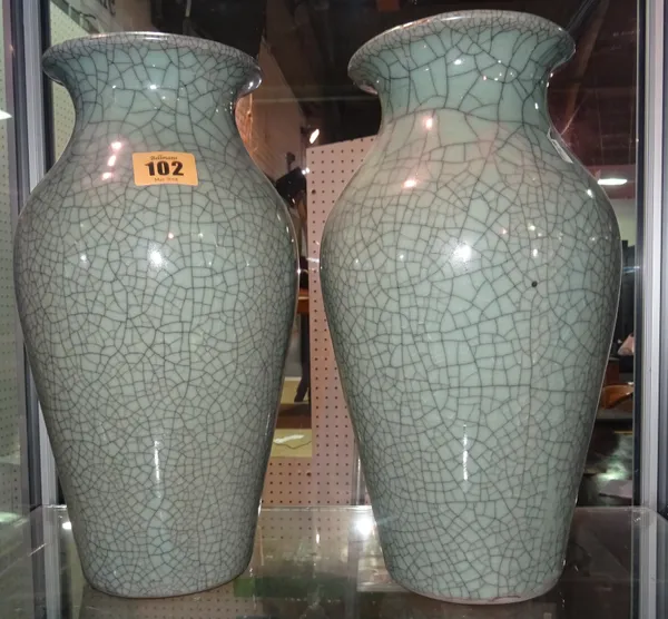 A pair of 20th century Asian style celadon crackle glaze vases, 31cm high, (2).  CAB