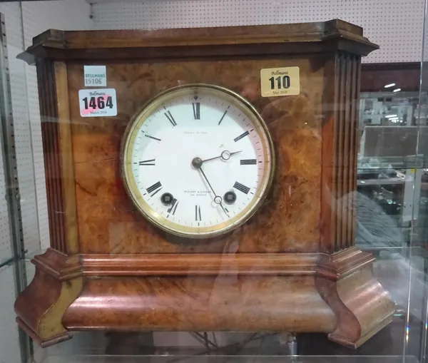 A French walnut eight day mantel clock, the white enamel dial detailed 'Wilson & Gandar, 392 Strand', the rectangular fluted case enclosing a two trai
