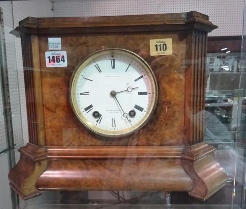 A French walnut eight day mantel clock, the white enamel dial detailed 'Wilson & Gandar, 392 Strand', the rectangular fluted case enclosing a two trai