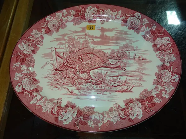 A large early 20th century oval Woods Burslem transfer printed serving dish, decorated with game birds.  CAB