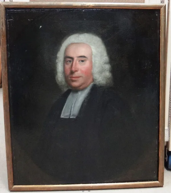 Follower of Thomas Hudson, Portrait of a lawyer, oil on canvas, in a feigned oval, 79cm x 66cm.
