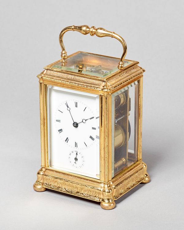 A French gilt brass grande and petite sonnerie engraved gorge case carriage clockBy Moser, Paris, No. 3671, circa 1870The case with bevelled glazed pa