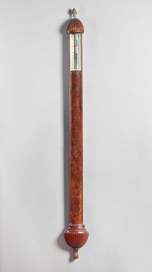 A bow-fronted mahogany stick barometerIn the style of Adie, Edinburgh, 20th CenturyThe gadrooned pediment with a foliate cast finial, above the silver