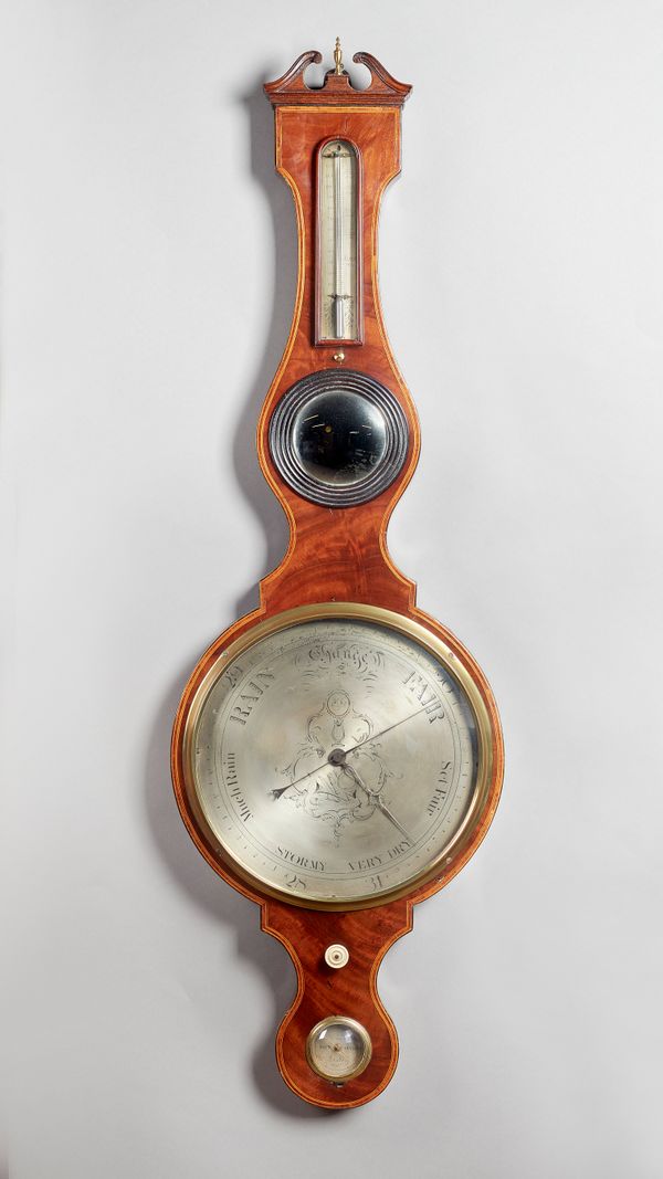 A Late Regency mahogany, tulipwood crossbanded and outlined wheel barometer By William Horrod, LondonThe swan neck pediment above a thermometer scale