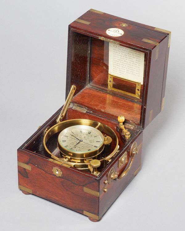 A rare and unusual brass-bound rosewood two-day Royal Observatory Marine Chronometer with Airy's Bar and Rokeby's side windingBy Charles Frodsham, Lon
