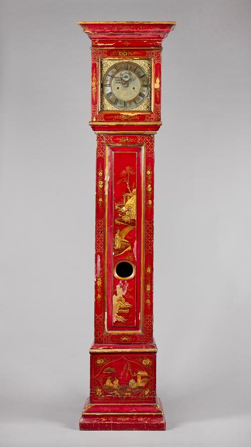 An interesting Chinoiserie scarlet lacquered longcase clockThe pediment with a moulded cornice above a glazed door, the trunk with a panelled door cen