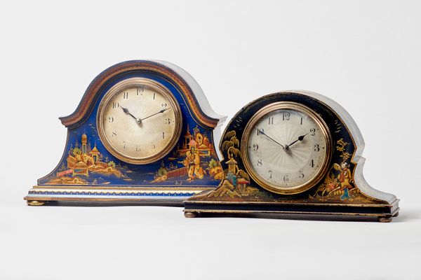 Two Edwardian chinoiserie decorated hump-back mantel timepiecesThe movements by CouailletOne case decorated  with a blue ground, the other black, each
