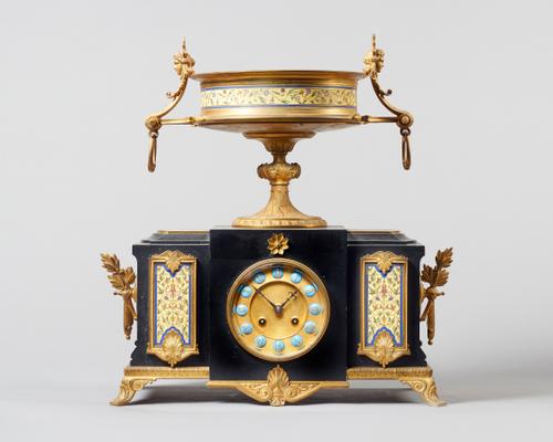 A French ormolu, cloisonne enamel black marble mantel clockIn the Grecian style, retailed by Maison Marnynac, Rue de la Paix, Paris, circa 1890Surmoun