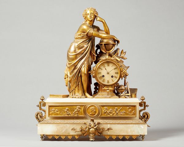 A French giltmetal and alabaster mantel clockMid 19th CenturyModelled with a female figure resting on a globe, with a drum-shaped case and movement, c