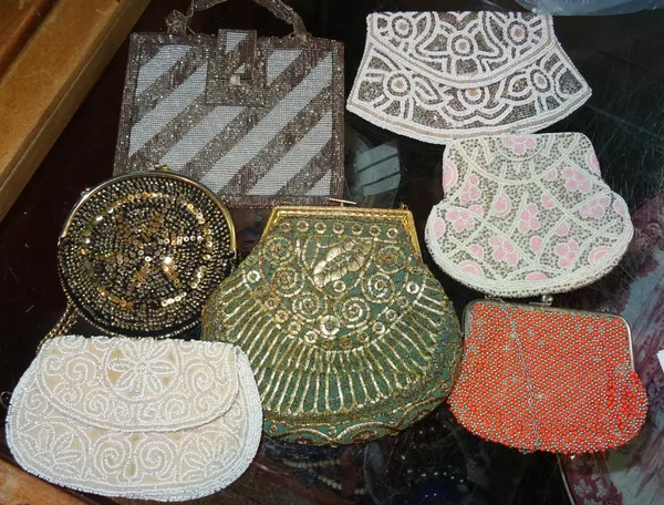 A group of early 20th century Art Deco style beadwork bags, including a faux coral and pearl example, (qty).   CAB