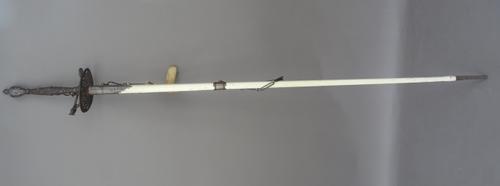 An English small sword with tri-form engraved gilt blued blade (78cm), oval steel hilt with foliate pierced decoration, shaped steel handle and chain