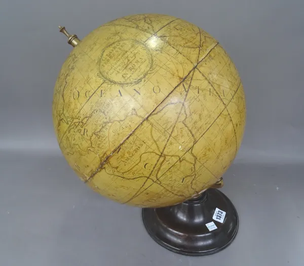A reproduction table globe labelled 'Globo Terrestre In Roma' on a loaded wooden circular base (a.f), approximately 14 inches diameter.