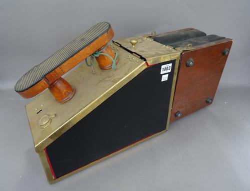 A portable shoe shine box, by The Traditional Victorian Shoeshine Company, mahogany and brass with a padded folding seat, 59cm wide.