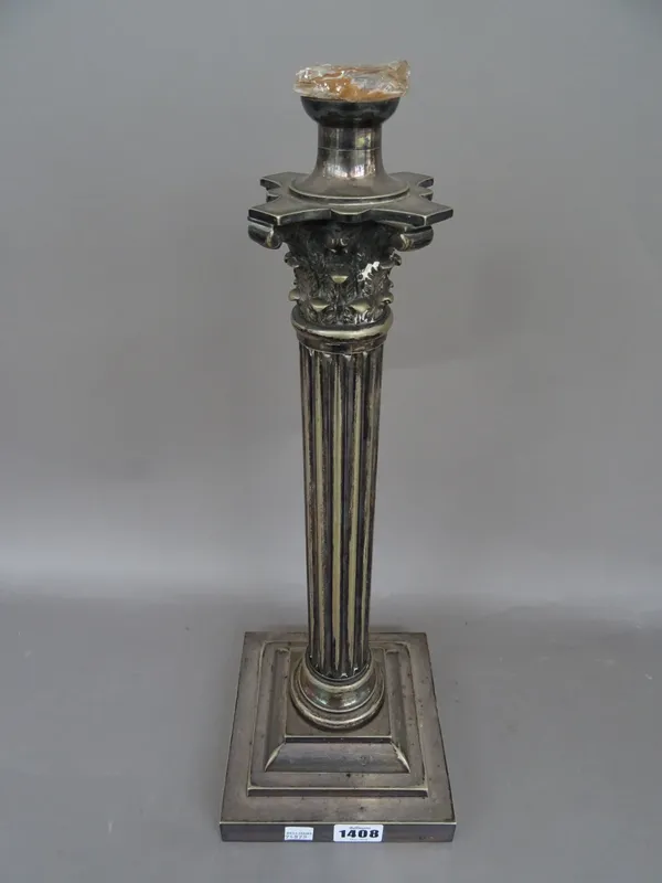 An Edwardian silver plated oil lamp of Corinthian column form, with cranberry glass reservoir, Duplex burner and three associated shades, (a.f).