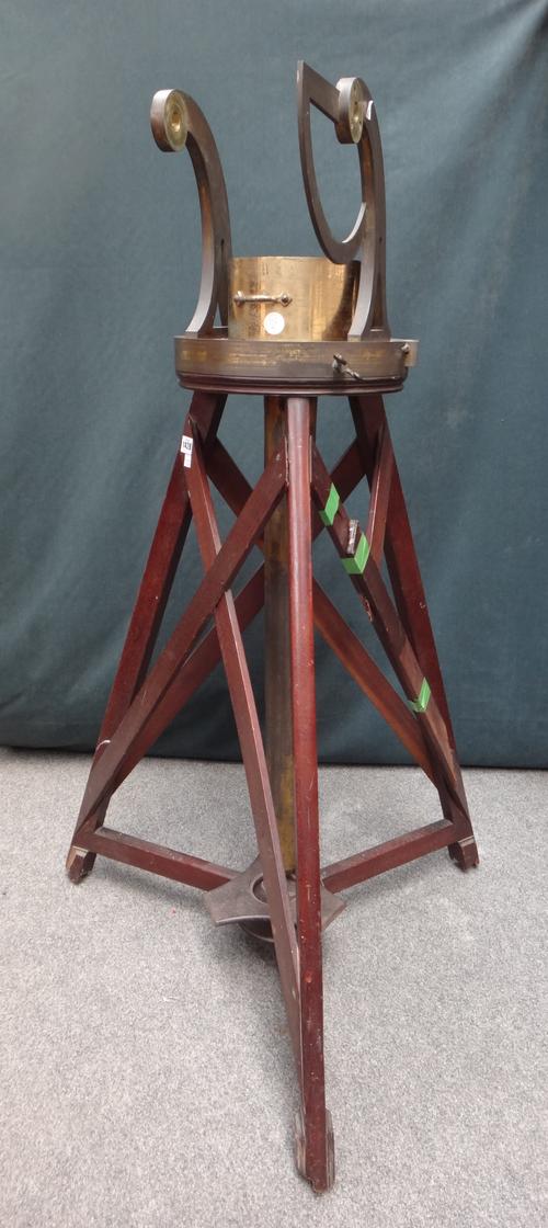 A George III gilt brass mounted mahogany telescope tripod, the tri-form base united by X-frame stretchers, 120cm high, (a.f).