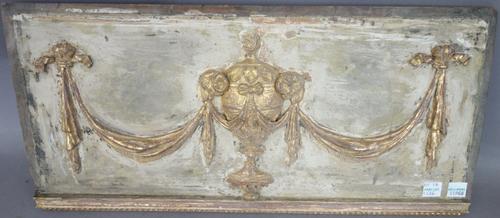 A pair of early 19th century carved wooden wall appliques, each with ribbon tied back plate and eagle surmount (80cm high) and a giltwood chimney piec