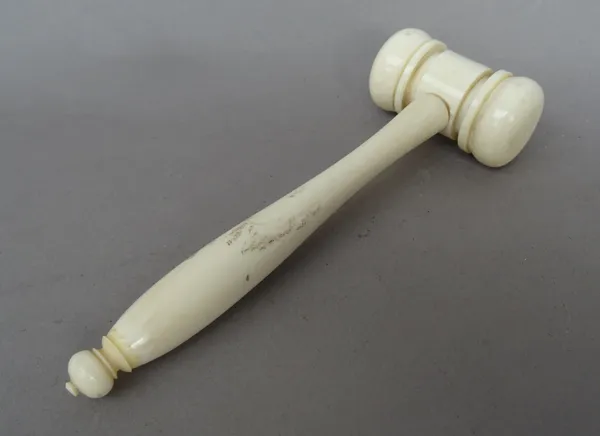An Edwardian turned ivory gavel of small proportions (14cm).