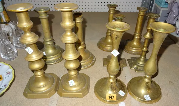 Collectables, including; a group of 19th century and later bronze and brass candlesticks, comprising five pairs, (10).  S4M