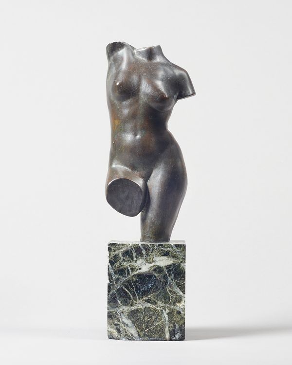 After the antique, a French reproduction bronze of Venus, 20th century, indistinctly signed on a green marble rectangular plinth, 31.5cm high, overall