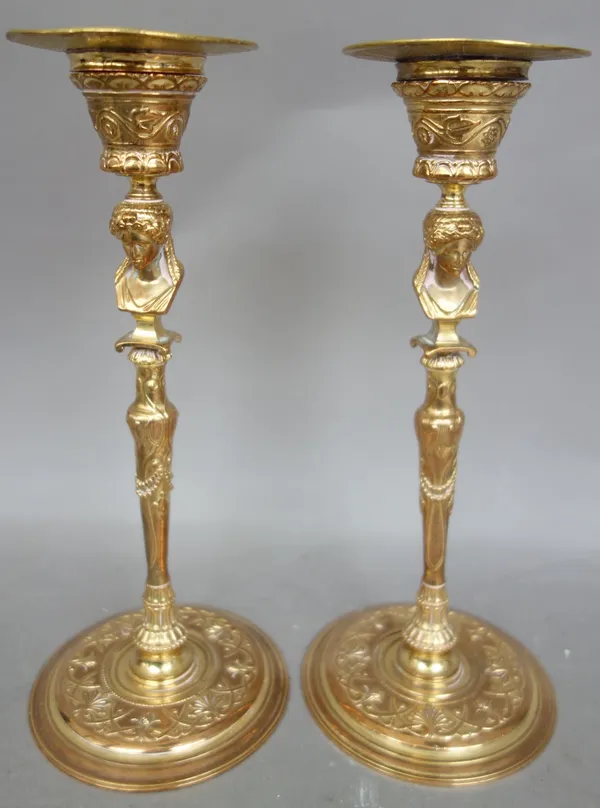 A pair of French gilt bronze Grecian style candlesticks, circa 1875, stamped 'F. BARBEDIENNE', 24cm high, (2).  Illustrated