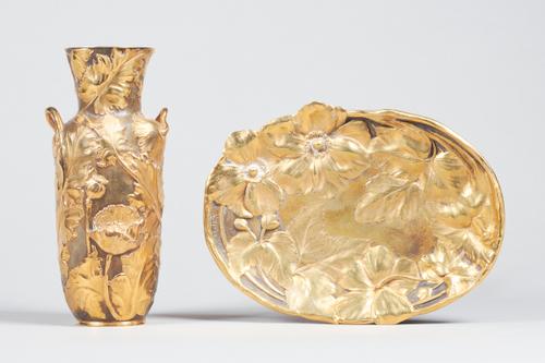 A French gilt and patinated bronze vase, of two handled foliate form, signed 'A. Vibert', stamped 'E. Colin & Co Paris' (24cm high) and a similar Fren