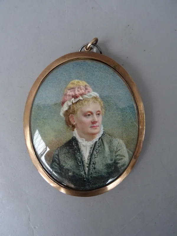 A 19th century Continental school portrait miniature on ivory, depicting a seductive young lady wearing a yellow dress, in a gilt composition frame, t