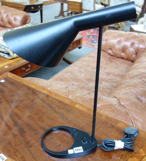 After Arne Jacobsen; a Danish Louis Poulsen 'AJ' table lamp, ebonised zinc with adjustable shade (52cm high) and a Flos 'Tab' blue aluminium floor lam