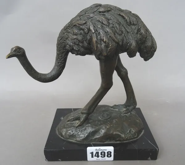 A modern bronze model of an ostrich, signed 'MILO' on a black marble rectangular plinth (bronze 15cm high) and a patinated bronze lion (16cm wide), (2