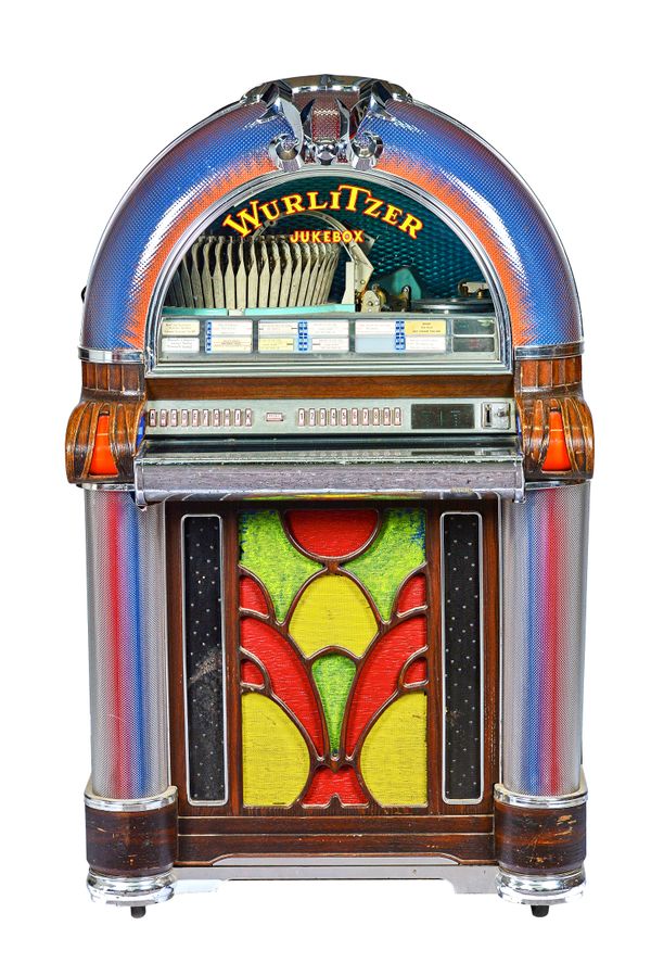 A Wurlitzer 'Sonata' multi-selector jukebox, model 1050, circa 1973, and a quantity of associated records, 152cm high.  Illustrated