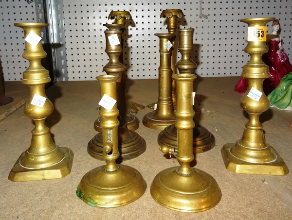 Collectables, including; a group of 18th century and later bronze and brass candlesticks, comprising five pairs, (10).  S4T
