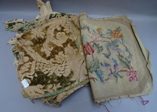 A George I needlework seat cover, the burgundy ground woven with foliage, a quantity of green velvet seat covers, probably 18th century and a quantity