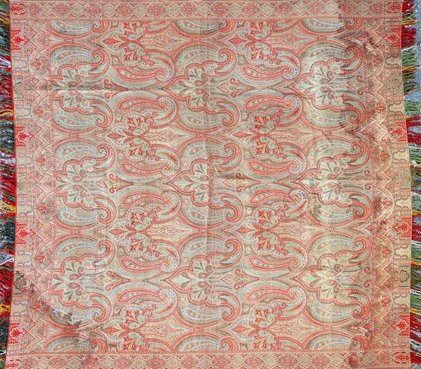 A Paisley shawl, rows of arabesque design, 180cm x 170cm.  Illustrated