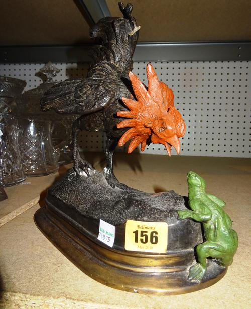 A 20th century bronze after Bergmann of a cockerel and a salamander, 25cm wide x 25cm high.  C9