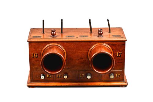 A mahogany double ballot box, with inset brass Yes/No panels, four lower drawers, gilt numbered '16' and '17', 50cm wide x 26cm high x 23cm deep.  Ill