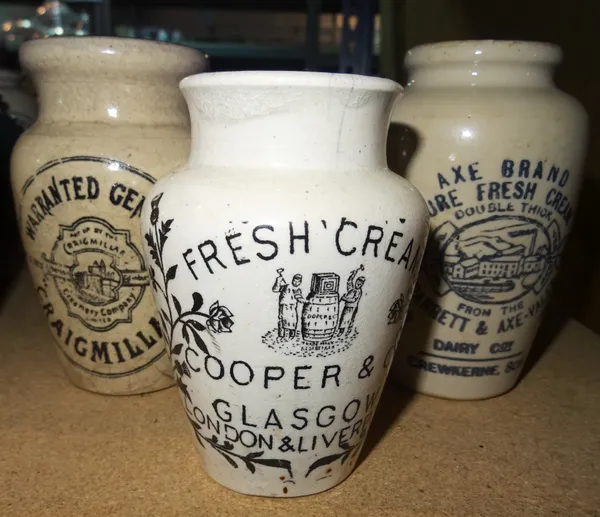 Stoneware, comprising; a large quantity of early 20th century cream jars from multiple dairies, (qty).  S3M