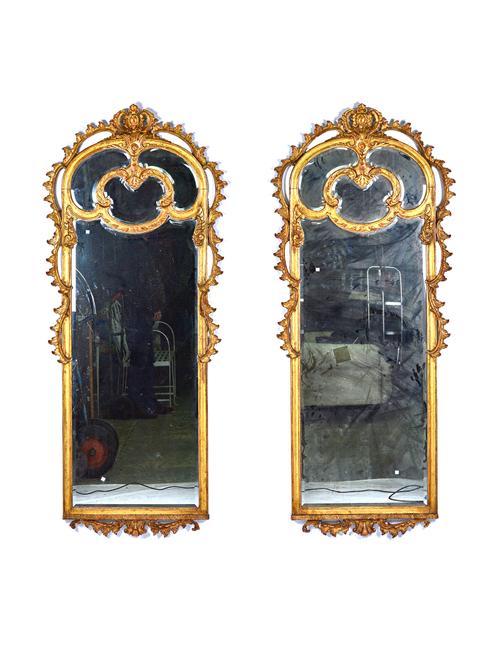 A pair of large 19th century gilt framed arch top bevelled glass marginal wall mirrors, with acanthus scroll mounts, 90cm wide x 218cm high, (2).  Ill