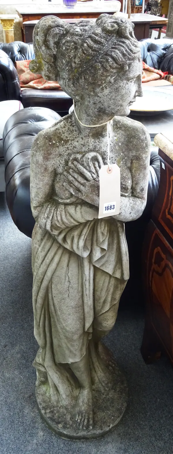 After Canova; a reconstituted stone figure of a robed female holding a garland of flowers, together with another similar, each approx 115cm high, (2).