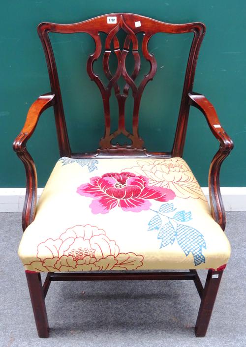 A George III mahogany carver chair, with pierced splat back and straight front seat, on canted square supports, 66cm wide x 96cm high.